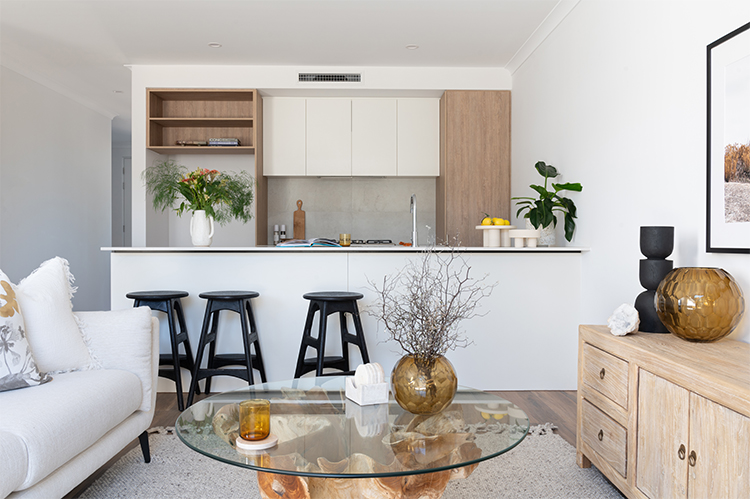 A kitchen and living area in one of the display homes at Stockland Canopy, Glendalough.