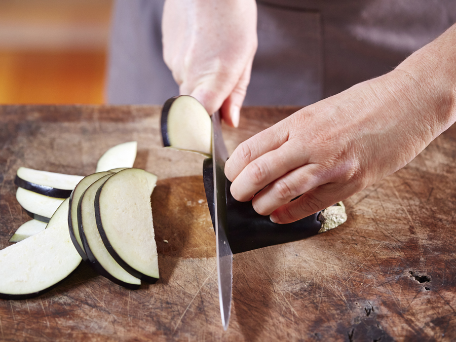 Using the cross chopping  on an eggplant