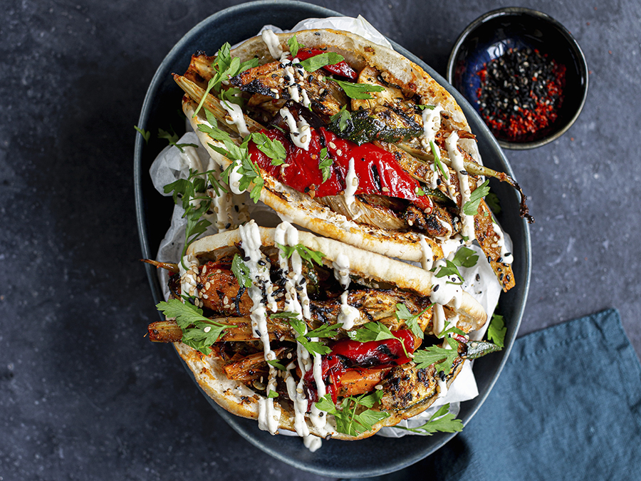 Vegetarian kebab in pita pockets with sesame garlic sauce.