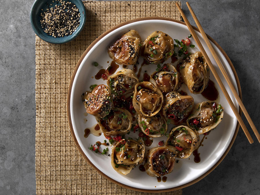 Miguel Maestre's Chorizo and Prawn Potstickers on a plate. 