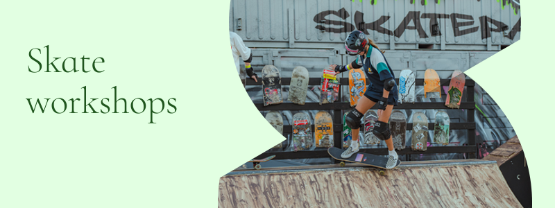 A girl on a skateboard at a skatepark